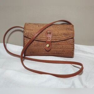 Rectangular wicker style cross body bag. 9x6 inches. NWOT